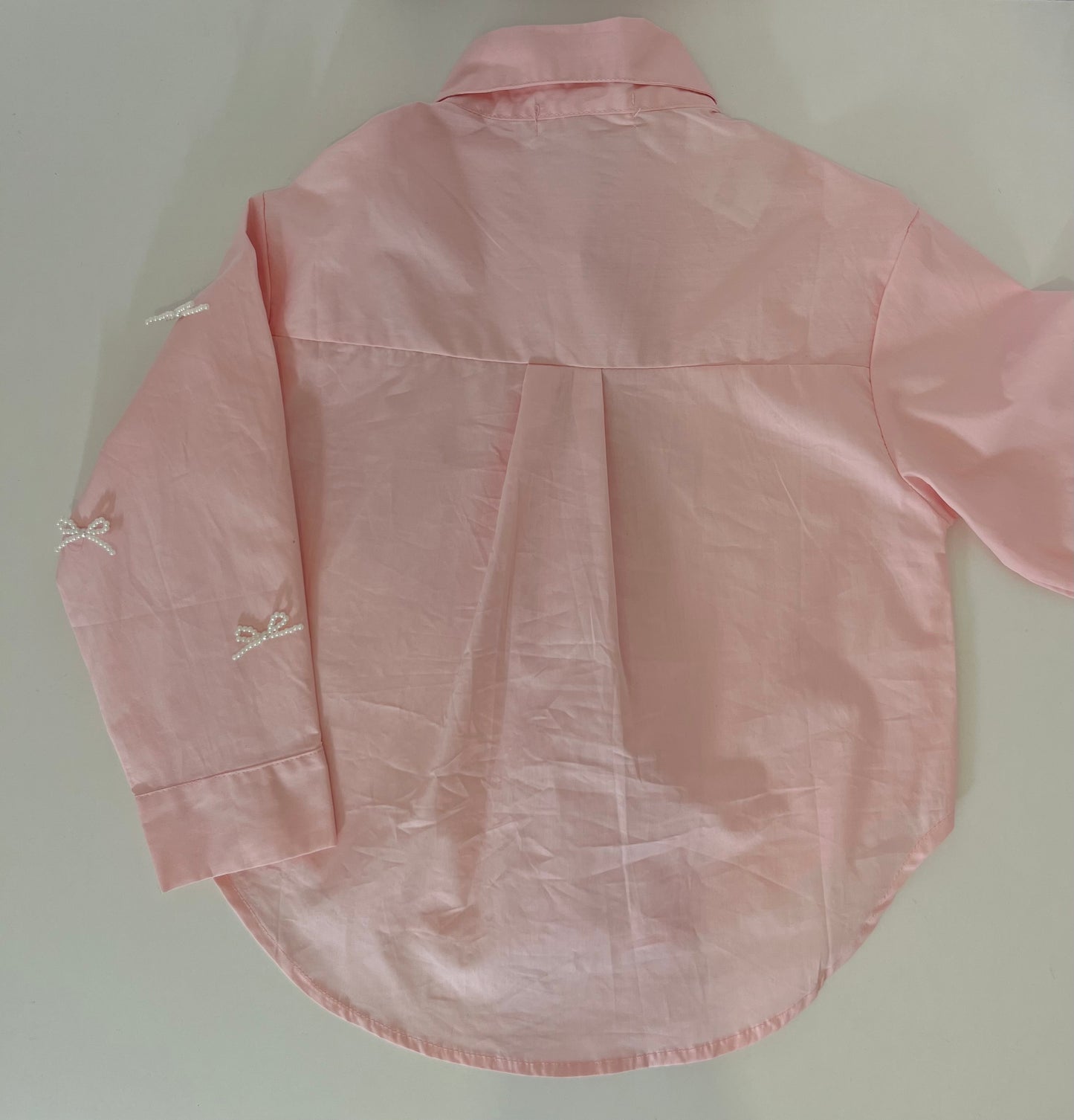 Chemise avec noeuds en perle