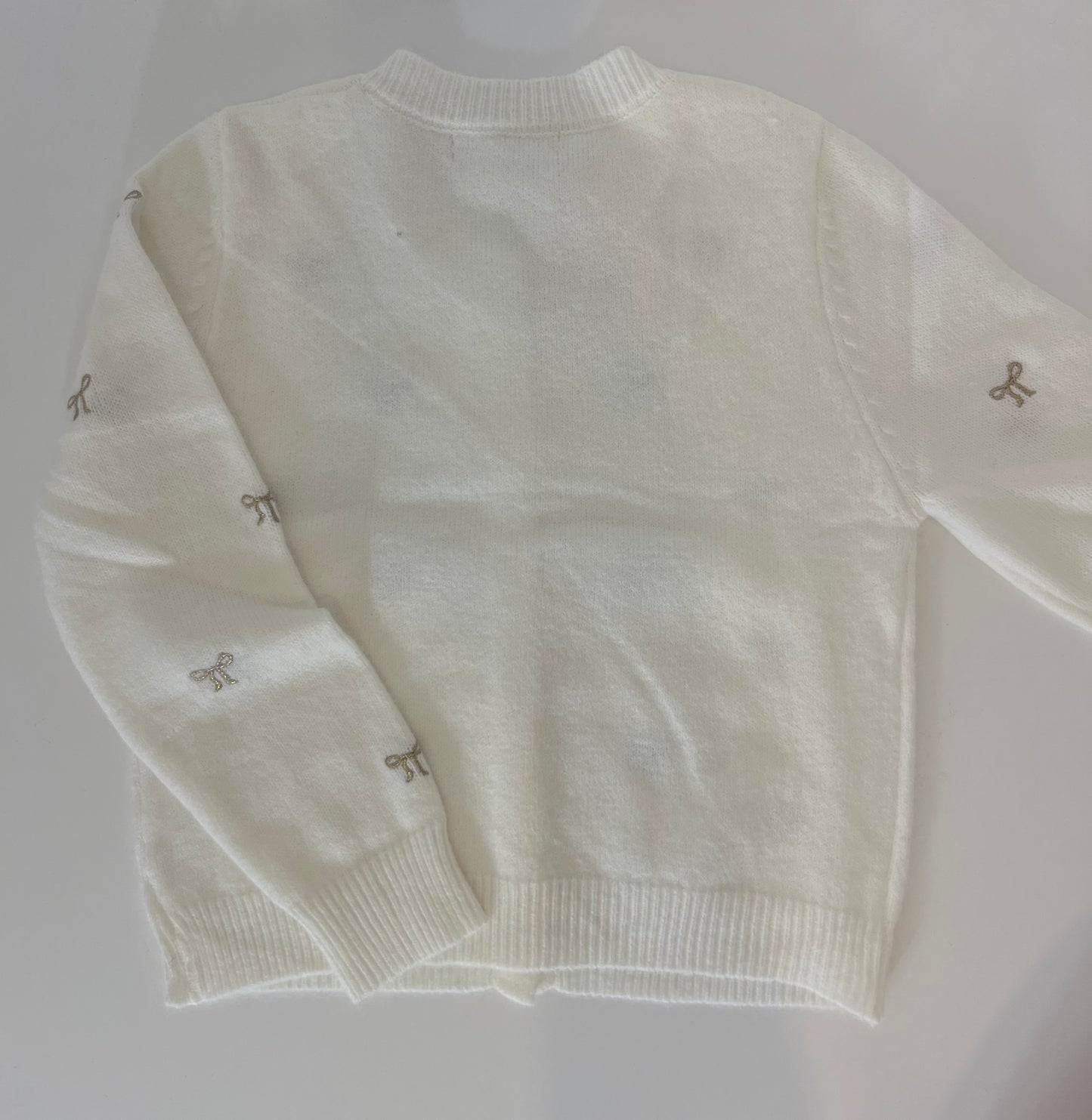 Gilet blanc avec petits noeuds brodés