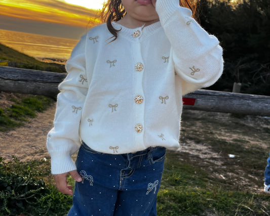 Gilet blanc avec petits noeuds brodés